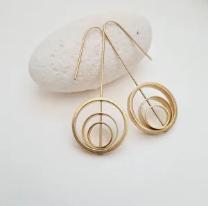 Consta rings within rings earrings by brass   bold